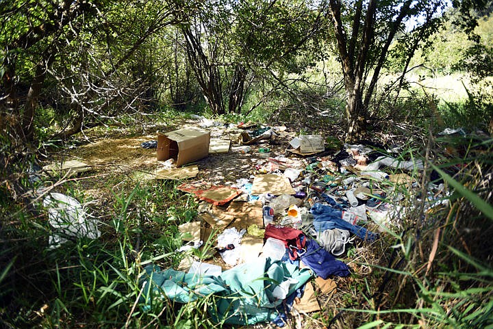 <p><strong>Referring to</strong> the mess left behind in the transient camps, Tim Merklinger said, “It looks like a Super Walmart exploded in the treeline.”  (Brenda Ahearn/Daily Inter Lake)</p>