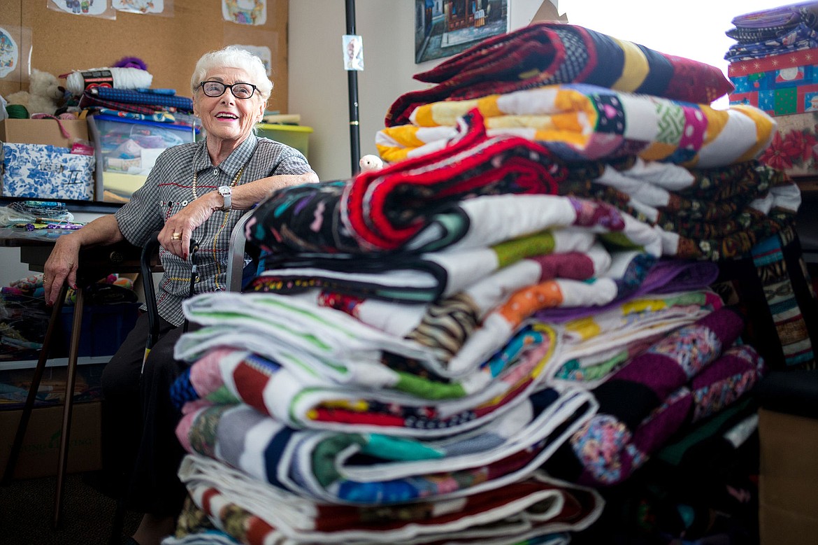 &lt;p&gt;Barbara McLean sits beside folded quilts she recently made that will go to children who are hospitalized in various hospitals around the region. Last week, McLean received a Lifetime Achievement Award from President Obama for her decades of volunteerism.&lt;/p&gt;