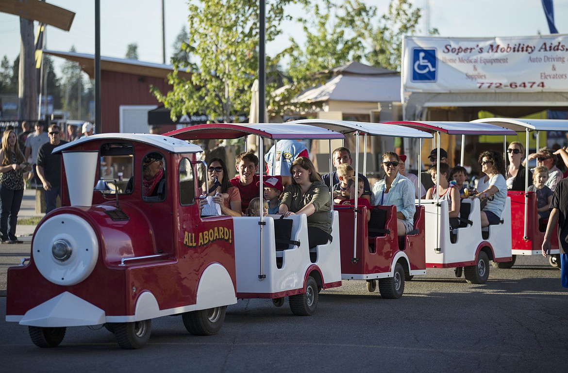 &lt;p&gt;Fair-goers go for a leisurely ride around the North Idaho State Fair on the All Aboard Express Train on Wednesday.&lt;/p&gt;