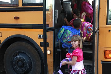 &lt;p&gt;1st grader Jaime boards the bus home after her first day of school.&#160;&lt;/p&gt;