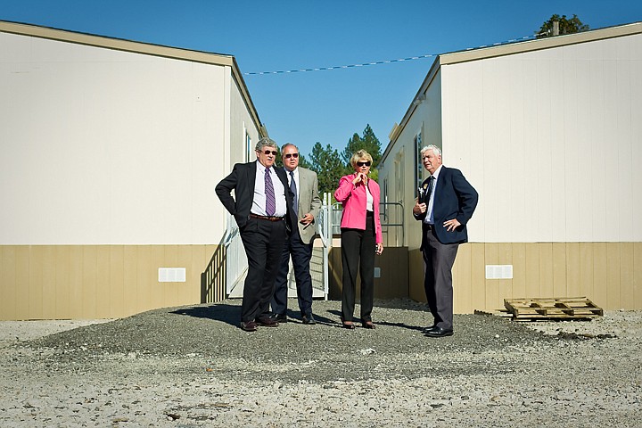 &lt;p&gt;Ron Dorn, left, North Idaho College vice president for resources management, Anthony Fernandez, Lewis-Clark State College president, Priscilla Bell, president of NIC, and Chet Herbst, LCSC vice president for finance and administration survey the area of the education corridor where two portable classrooms for LCSC were toured Tuesday.&lt;/p&gt;