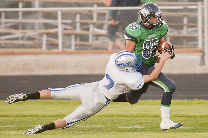 &lt;p&gt;GLACIER wide receiver Anthony Gugliuzza (85) tries to shake off
a tackle by Billings Skyview&#146;s Alex Zacher during Friday night&#146;s
Class AA season-opening football game at Legends Stadium.&lt;/p&gt;