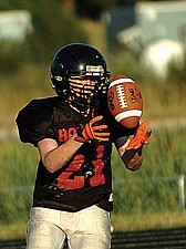 Ronan junior Jack Humphreys hauls in an interception during the Ronan Orange/Black Scrimmage.