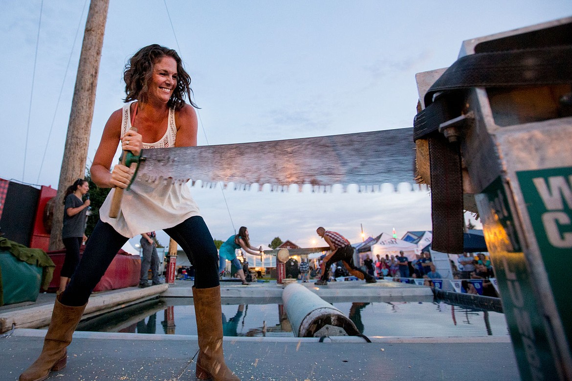 &lt;p&gt;Magen Gray of Coeur d'Alene uses a cross-cut saw for the first time after she was pulled onstage from the spectating crowd on Thursday at the West Coast Lumberjacks Show at the North Idaho State Fair. &quot;It wasn't as hard as I expected,&quot; Gray says. &quot;I had tons of fun; those guys put on a great show.&quot;&lt;/p&gt;