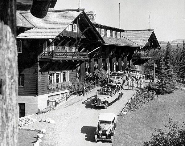 &lt;p&gt;National Park Service; Glacier National Park Archives/Photo by Hileman, T.J. Tour buses parked in front of Glacier Park Lodge (Hotel), 1940. Four Blackfeet and other visitors stand out front.&lt;/p&gt;