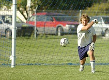 Polson junior goalkeeper Clay Frissell returns the ball during the soccer team scrimmage last Saturday in Polson.