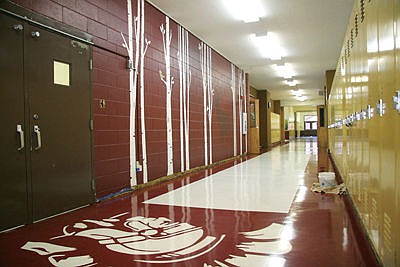 &lt;p&gt;The brand-new Troy High School wall murals and tile, complete with the Troy Trojan design. (Bethany Rolfson/The Western News)&lt;/p&gt;