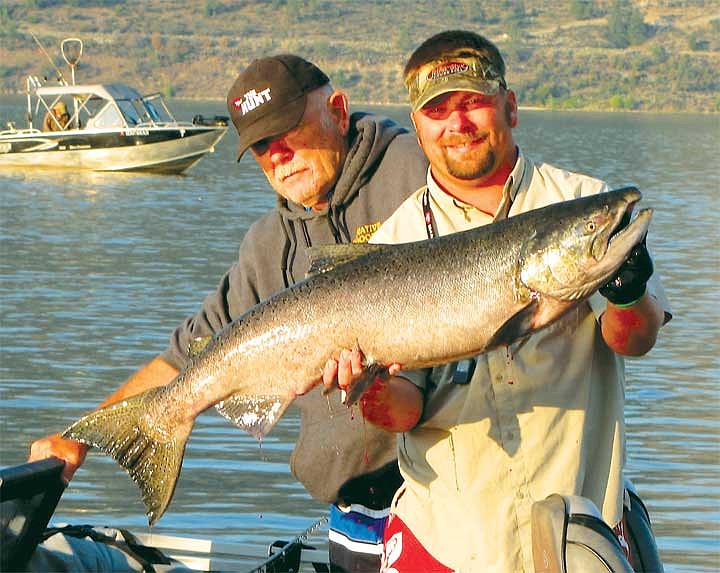 Jerrod Gibbons, Okanogan Valley Guide Service, hefts a king estimated at 30-pounds.&#160; He hooked the fish while trolling the Okanogan River.