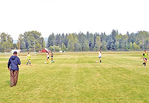&lt;p&gt;Second-year coach Joe Cik watches as his girls prepare for a game of knockout, a handling exercise. Senior forwards Elly Webster and Sarah Nash, along with midfielders Callan Peel and Breanna Opland will provide much of the scoring for the Lady Loggers.&lt;/p&gt;