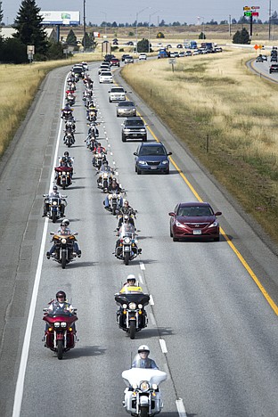 &lt;p&gt;GABE GREEN/Press Rows of veterans ride down I-90 Wednesday morning on motorcycles, escorting a Vietnam memorial wall. The Wall that Heals, which recognizes those lost during the Vietnam War, and the Wall of Remembrance, honoring those lost during the Global War on Terror, will be on display Friday through Sunday at 7 p.m. at the baseball field behind Hayden City Hall. An opening ceremony will be held at 10 a.m. on Friday. The walls are open for viewing 24 hours a day. There is no admission, but donations will be accepted.&lt;/p&gt;