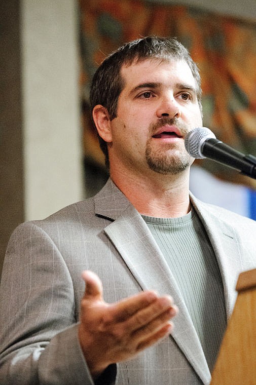 <p>Jim Lynch and Chad Graham discuss the future of the Kalispell City Airport on Tuesday afternoon during the Kalispell Chamber of Commerce's monthly luncheon at the Red Lion Hotel.</p>