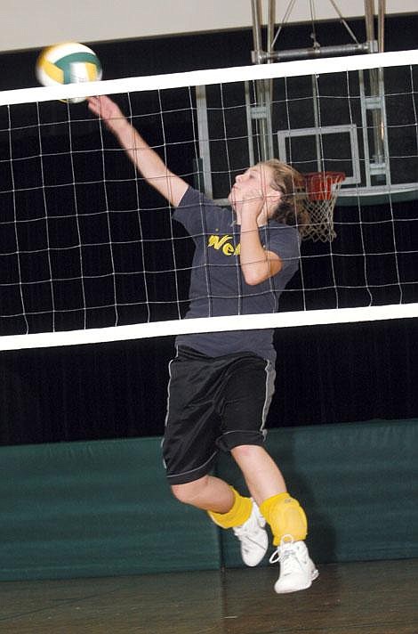 Nick Ianniello/Mineral Independent St. Regis Tiger Brianna Managhan spikes the ball Friday afternoon.