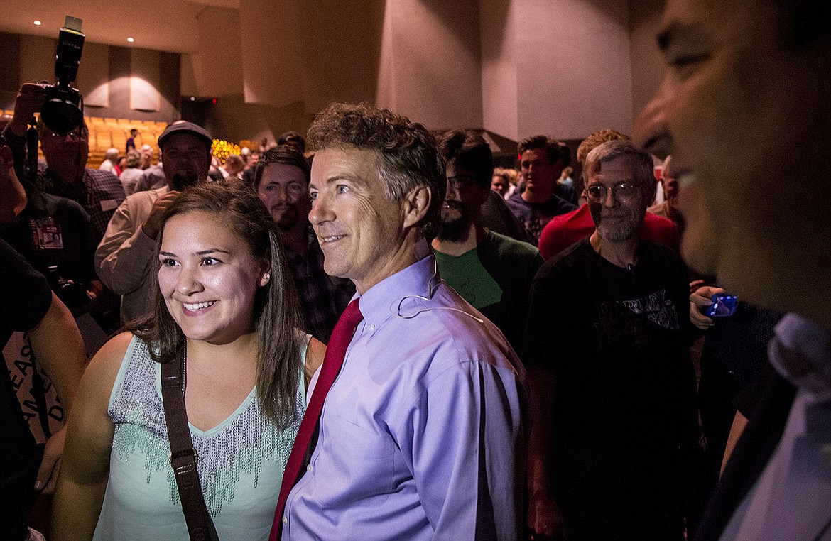 &lt;p&gt;Christy Poirier, a Washington State University student, has her photo taken with Republican presidential candidate Rand Paul on Wednesday at a rally at North Idaho College.&lt;/p&gt;