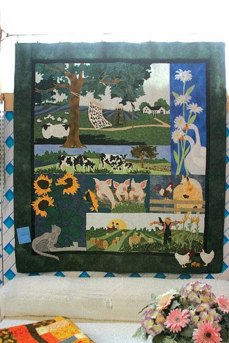 Jamie Doran/Valley Press Ruth Hamilton, of Plains, displays her quilt at the fair.