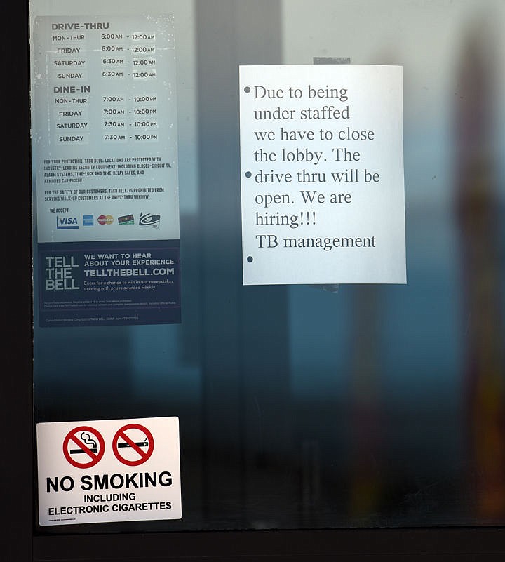 &lt;p&gt;Signs on the front door of Taco Bell in Kalispell one of which explains that the lobby is currently closed due to understaffing. (Brenda Ahearn/Daily Inter Lake)&lt;/p&gt;