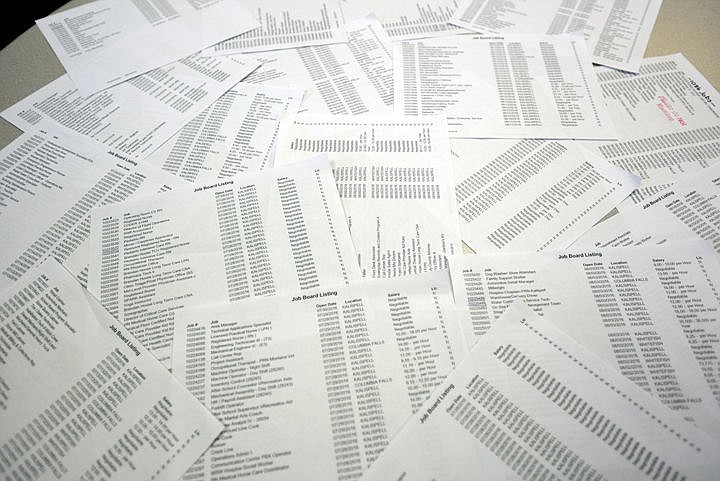 <p>One printout of the daily Jobs Board on Thursday, August 25, had 1087 job openings. This photograph is one printout only, jobs are printed on front and backs of these pages. (Brenda Ahearn/Daily Inter Lake)</p>