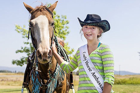 &lt;p&gt;Sarah Thaut, an 11-year-old Curly Horse Ambassador, poses for a portrait with her chestnut curly horse &#147;Twiz&#148; August 13 in the front yard of the Thaut&#146;s home in St. Maries.&lt;/p&gt;