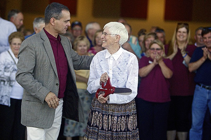 &lt;p&gt;JEROME A. POLLOS/Press Mark Cotner, director of the Kootenai Technical Education Campus, thanks Helen Meyer for her participation in the ribbon cutting ceremony for the facility Monday. The Meyer family donated half of the land for the 20-acre campus that will provide professional-technical education courses.&lt;/p&gt;