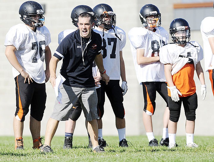 &lt;p&gt;Flathead Braves head football coach Kyle Samson instructs his team during practice at Legends Stadium on Wednesday. Flathead opens the season tonight at Legends Stadium at 7 versus Great Falls High. Samson is in his first year with the Braves. (Aaric Bryan/Daily Inter Lake)&lt;/p&gt;