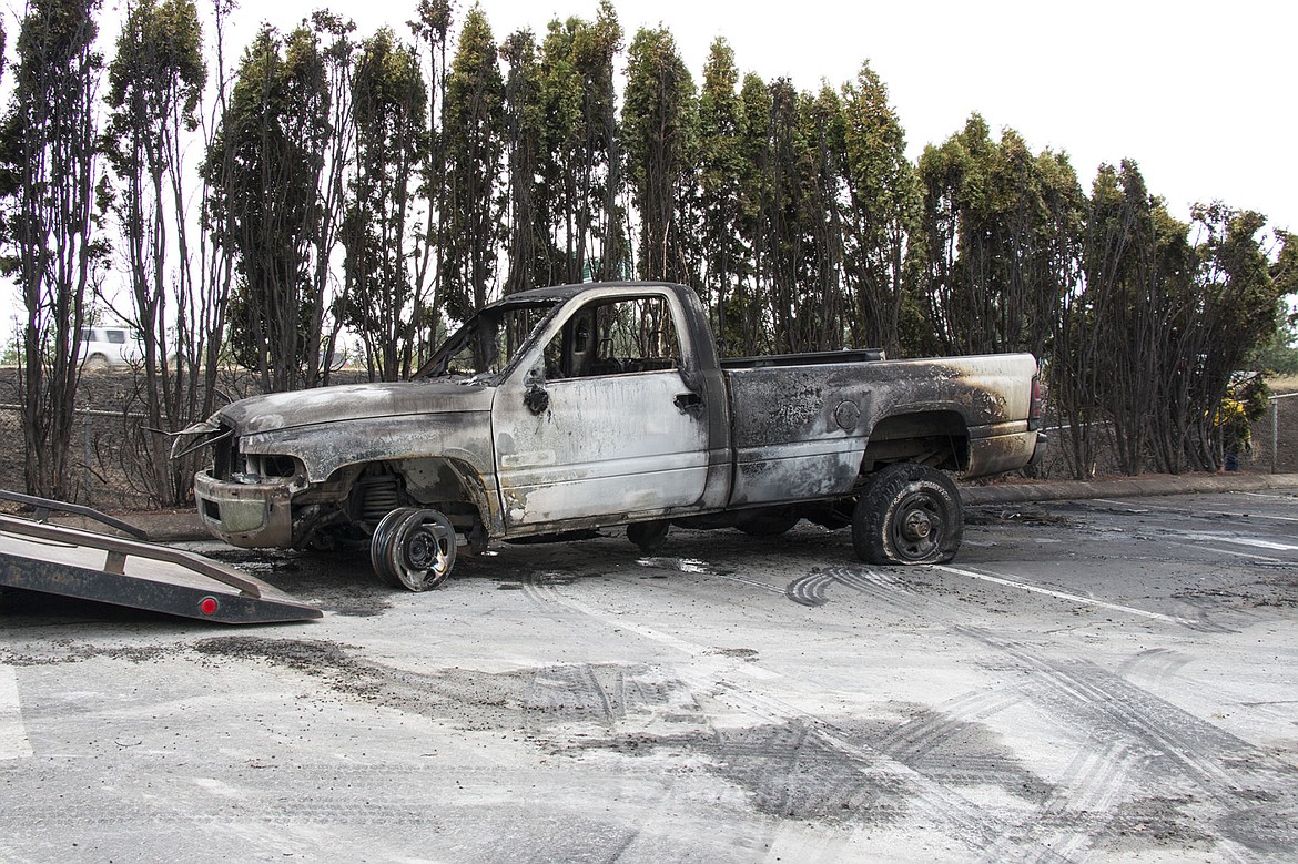 &lt;p&gt;BETHANY BLITZ/Press&lt;/p&gt;&lt;p&gt;One of the four cars that was destroyed by the fire near Interstate 90 and U.S. 95 waits to be loaded onto a tow truck. No one was hurt in the fire.&lt;/p&gt;