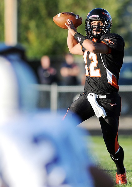 Flathead quarterback Mike VanArendonk, 12, throwing a pass during the game against Butte on Friday in Kalispell.