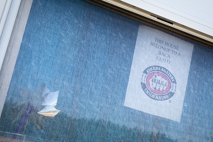 &lt;p&gt;A flyer hangs in the window of the first local B.A.C.A. child's home in Hauser Lake.&lt;/p&gt;