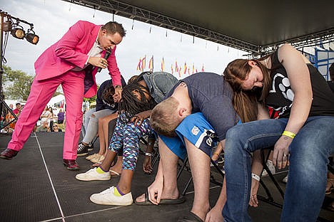 &lt;p&gt;Hypnotist Richard Barker, left, works his magic on a group of hypnotized volunteers during a performance Friday at the North Idaho Fair and Rodeo at the Kootenai County Fairground.&lt;/p&gt;