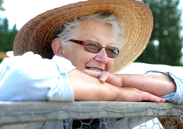 Lyn Hendrix smiles as she looks out over Walking Bear Ranch on Thursday, July 29.