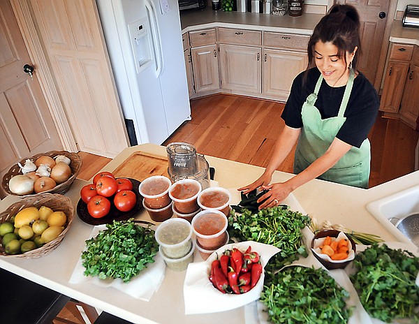 &lt;p&gt;Jeannie Sattler of Whitefish works in her kitchen on Wednesday
afternoon preparing vegetables and making salsa to sale on Saturday
at the US Troop Fund Bake Sale at Army/Navy of Whitefish. The sale
is scheduled to run from 10 a.m. to 4 p.m. Proceeds will be used to
purchase and ship supplies to troops and schools in Afghanistan.
Also at the bake sale people can view and buy raffle tickets for a
quilt that will be raffled at noon on September 11 at the Whitefish
VFW. Sattler has volunteered for the bake sale for four years.
Later this week she'll be working on bananna nut bread and cherry
pie, also for the sale.&lt;/p&gt;