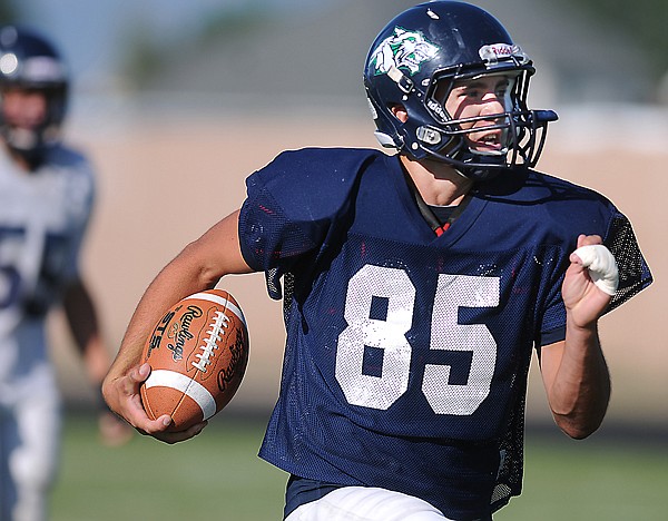 &lt;p&gt;Anthony Gugliuzza returns a kick during practice on Wednesday at
Glacier High School.&lt;/p&gt;