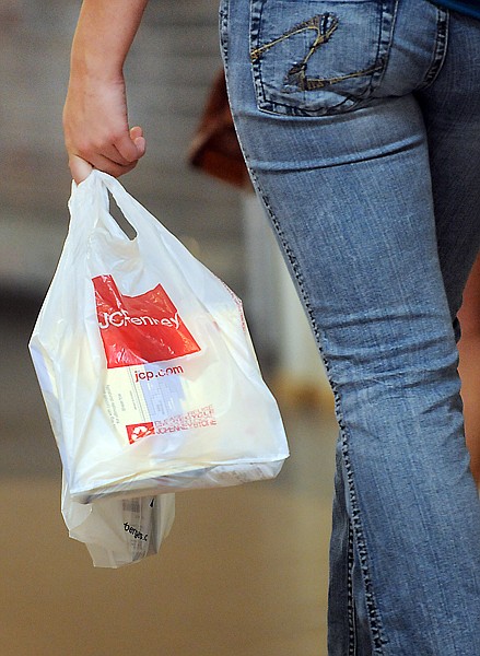 &lt;p&gt;A shopper makes her way through the Kalispell Center Mall on
Monday afternoon.&lt;/p&gt;