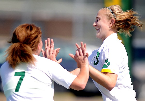 &lt;p&gt;Whitefish sophomore Kayla Simmes (7) shares in a moment of
jubilation after teammate Madison Grady (3) scores a goal during
the first half of their soccer match against Stevensville on Friday
in Whitefish.&lt;/p&gt;