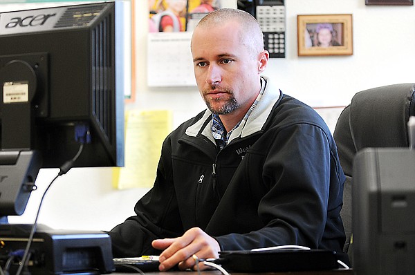 &lt;p&gt;West Glacier Elementary School Principal Cory Pierce uses the
quiet early hours of Thursday to work on a paperwork related to a
Montana Office of Public Instruction grant. Students at West
Glacier will start back to school on September 1st.&lt;/p&gt;