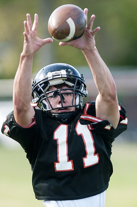 &lt;p&gt;Kevin Grosswiler catches the ball during wide receiver drills at
Flathead High School football practice on Wednesday afternoon.&lt;/p&gt;