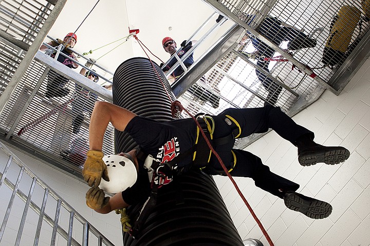 &lt;p&gt;Jim Dyk, center, hangs limp to simulate an unconscious person in
need of help during a ropes training exercise at the Kalispell Fire
Department North Station on Wednesday afternoon.&lt;/p&gt;