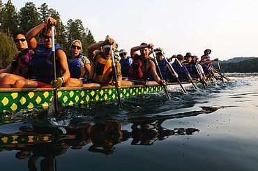<p>Team Flathead DragonFlies paddles back to the dock Wednesday evening after a dragon-boat practice in Somers Bay on Flathead Lake. The Flathead DragonFlies is a new team formed from members of last years Kalispell Lions team. The team recently competed in its first international race in Lethbridge, Alberta, and placed third.</p>