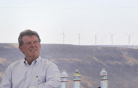 &lt;p&gt;Governor Butch Otter listens to a speaker while windmills spin in the distance during the Idaho Wind Partners Groundbreaking on Tuesday in Bliss, Idaho.&lt;/p&gt;