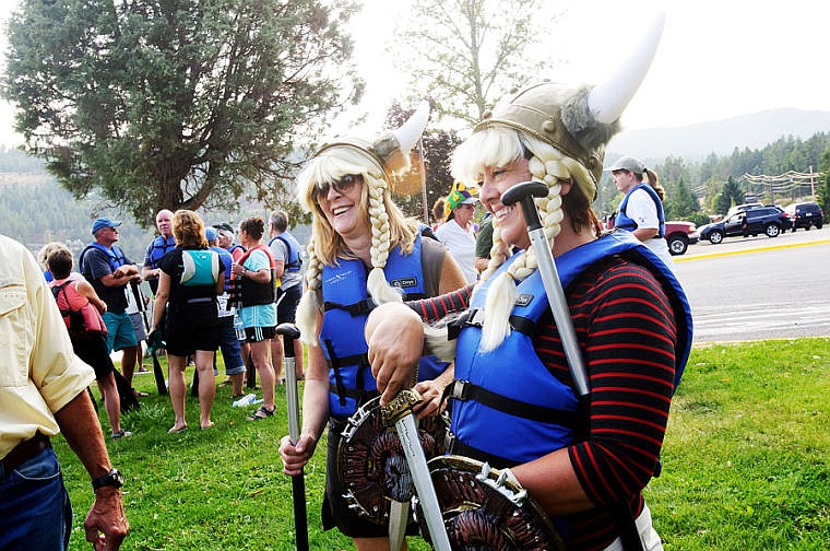 &lt;p&gt;Wendy Marshall, right, and Tanya Sgrenci show their spirt by dressing as vikings Wednesday evening during a Dragonboat practice for teams Flathead DragonFlies and Major Threat in Somers Bay on Flathead Lake. Aug. 28, 2013 in Somers, Montana. (Patrick Cote/Daily Inter Lake)&lt;/p&gt;