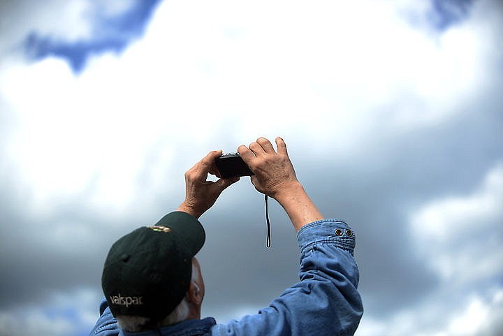 &lt;p&gt;A man aims his camera at the sky for the Thunderbirds performance on Saturday, August 30 at the Mountain Madness Air Show. (Brenda Ahearn/Daily Inter Lake)&lt;/p&gt;