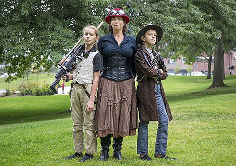 &lt;p&gt;From left to right, Zane, 12, Kirsten, and Frey Pomerantz, 10, pose for a portrait in steampunk outfits they designed themselves Saturday at the first-ever Coeur d&#146;Con comic con at the Coeur d&#146;Alene Public Library.&lt;/p&gt;