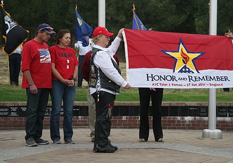 &lt;p&gt;Gold Star Parents T.J. and Sherri Patton, left, watch as Idaho Patriot Guard Riders unfold and display the Honor and Remember flag bearing the name of their son, A1C Tyler J. Patton, during a ceremony Saturday at the Fallen Heroes Plaza on Cherry Hill. Tyler was only 20 when he was hit by a car and killed while stationed in Suffolk, England, four years ago.&lt;/p&gt;