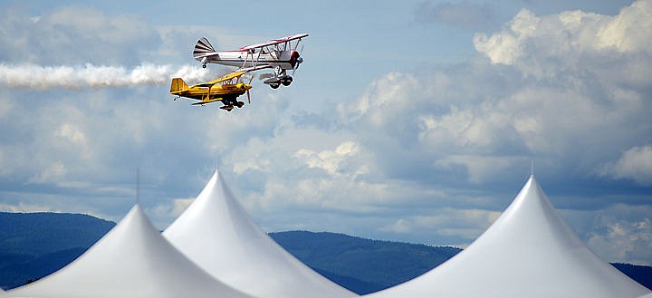 &lt;p&gt;Planes fly over tents on Saturday, August 30 at the Mountain Madness Air Show. (Brenda Ahearn/Daily Inter Lake)&lt;/p&gt;