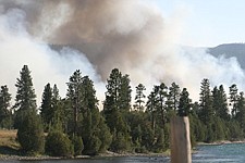 Smoke billows from the West Buffalo Bridge Fire Thursday evening near Polson. The blaze burned 42 acres but is contained, according to Polson firefighter Karen Sargeant. The cause of the fire is still under investigation.