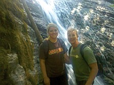 Dakota Peterson, left, and Andy White stand in front of a waterfall minutes before reaching the clearing where the whole ordeal started.