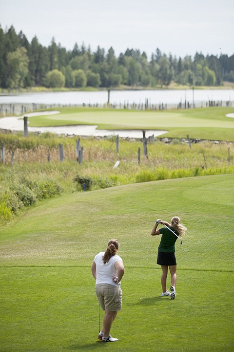 &lt;p&gt;Lindsey Trent, right, senior from Hellgate High School, tees off
on the seventh hole during the Flatfish Invitational on Monday
afternoon at Whitefish Lake Golf Club.&lt;/p&gt;