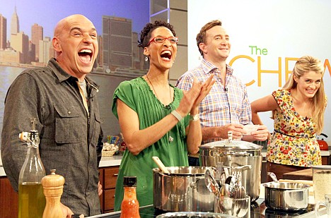 &lt;p&gt;This Friday, Aug. 26, 2011 photo shows co-hosts of ABC's &quot;The Chew&quot;, from left to right, Iron Chef Michael Symon, Carla Hall, Clinton Kelly and Daphne Oz as they react to audience applause during a rehearsal of the show in New York. Can some of food and style TV's biggest stars help ABC soap fans get over cancellation of their favorite stories? The network's counting on it for &quot;The Chew.&quot; (AP Photo/Tina Fineberg)&lt;/p&gt;