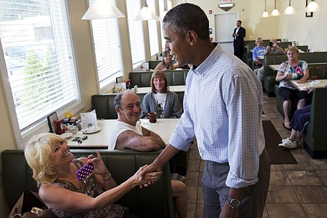 &lt;p&gt;President Barack Obama greets patrons at Bingham's Family Restaurant, where he stopped to buy pie, in Lenox, Pa., ON AUG. 23.&lt;/p&gt;