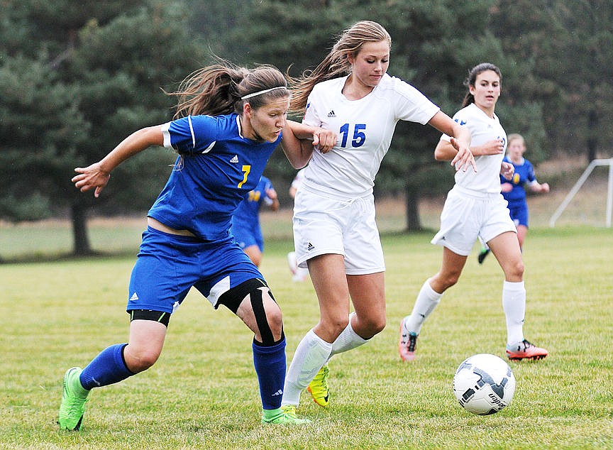 <p>Libby's Allie Coldwell and Bigfork's Halie Norred battle for a ball during the first half of Bigfork on Thursday, Oct. 1, 2015 in this file photo. (Aaric Bryan/Daily Inter Lake)</p>