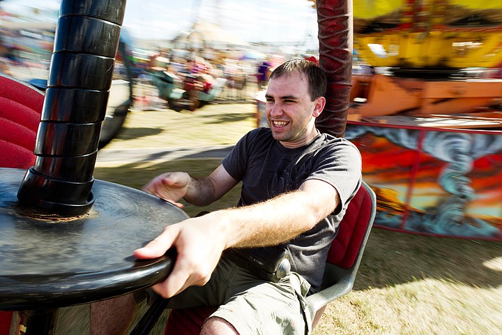 &lt;p&gt;SHAWN GUST/Press Mike James reacts while spinning his seat during a ride on the Tornado.&lt;/p&gt;