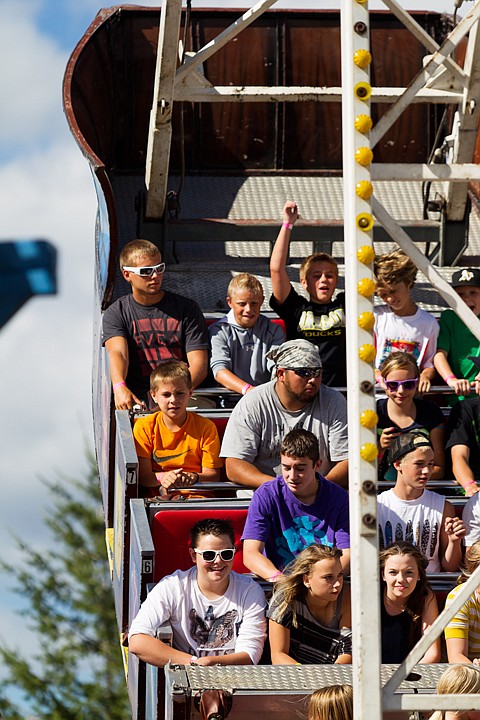 &lt;p&gt;SHAWN GUST/Press Carnival enthusiasts are catapulted in the air while riding the Sea Dragon.&lt;/p&gt;